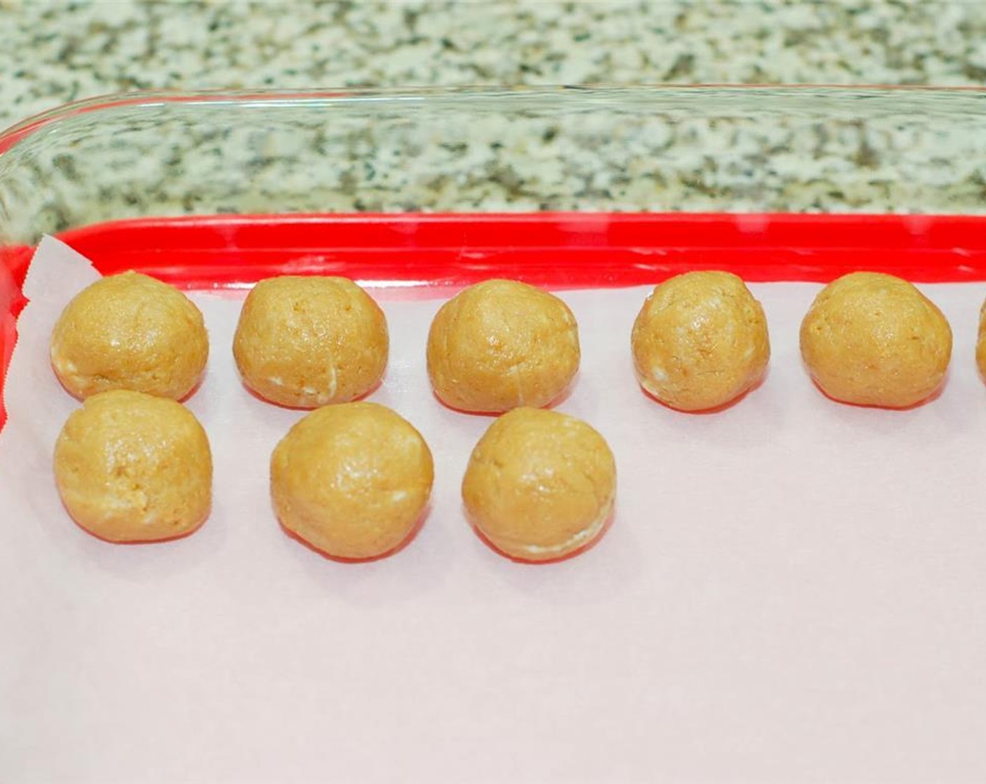 step 3 Roll mixture into quarter size balls, about 1 tablespoon's worth, and place in airtight container lined with wax paper. Place the container in the refrigerator overnight to set or in the freezer for at least an hour.