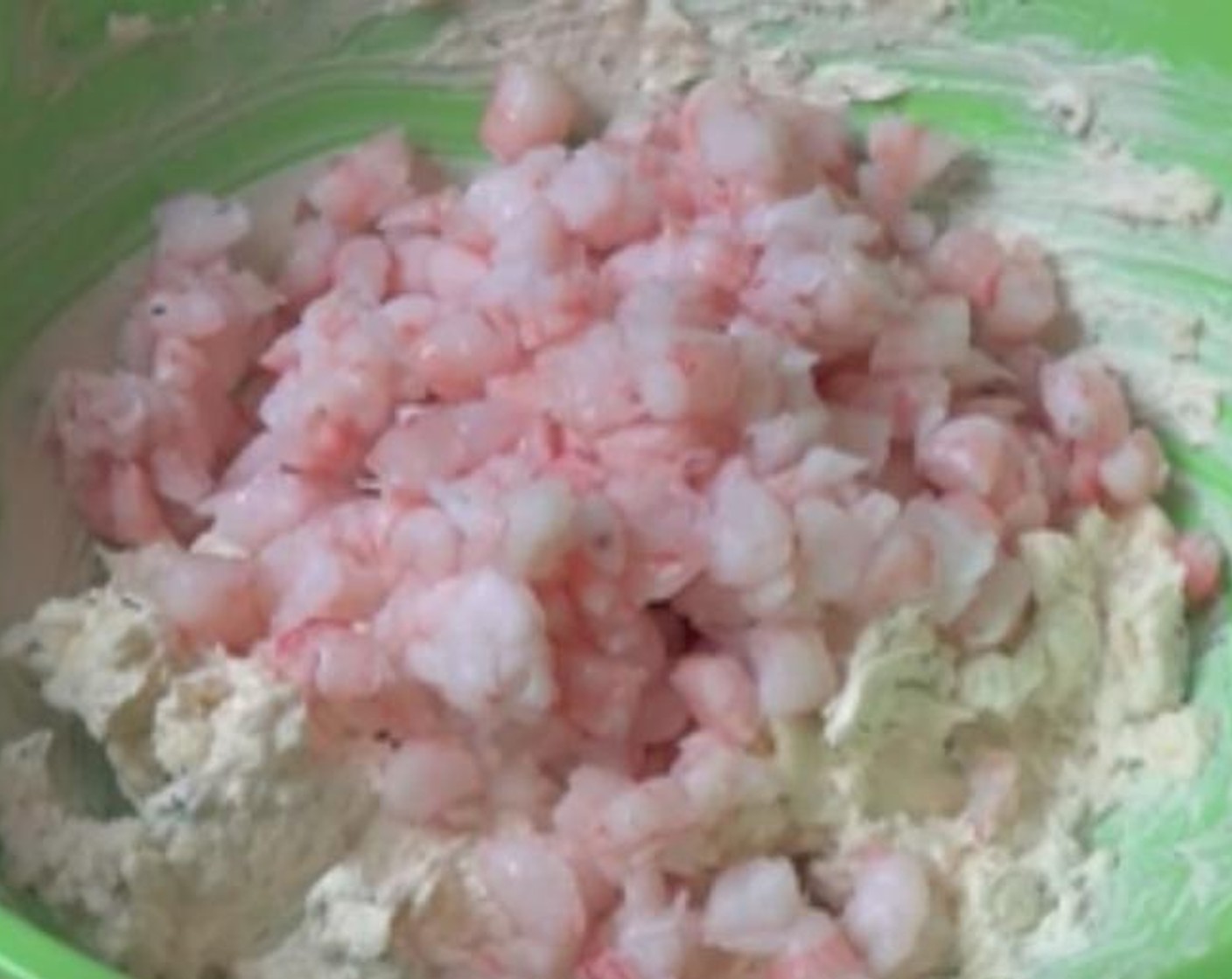 step 3 Add the Prawns (9 oz) into the bowl and stir everything together.