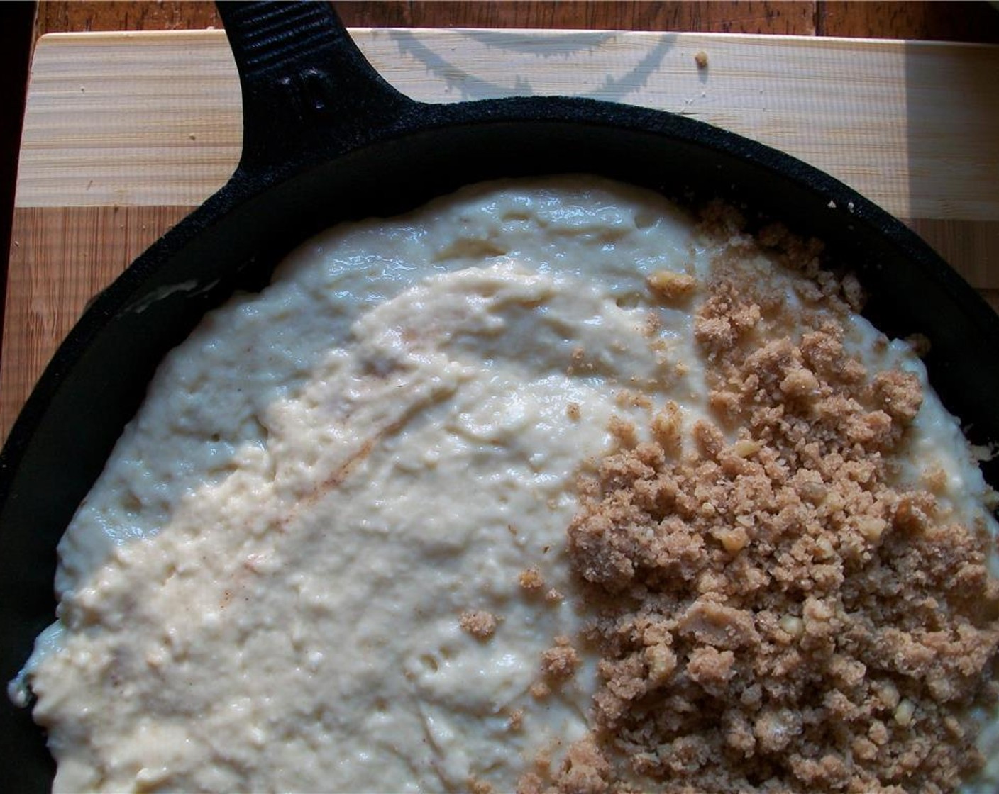 step 6 Combine remaining Unsalted Butter (1/2 cup), Brown Sugar (1/2 cup), Ground Cinnamon (1 Tbsp), walnuts, and remaining All-Purpose Flour (4 Tbsp) with a pastry blender or fork until crumbly. Sprinkle over top of cake.