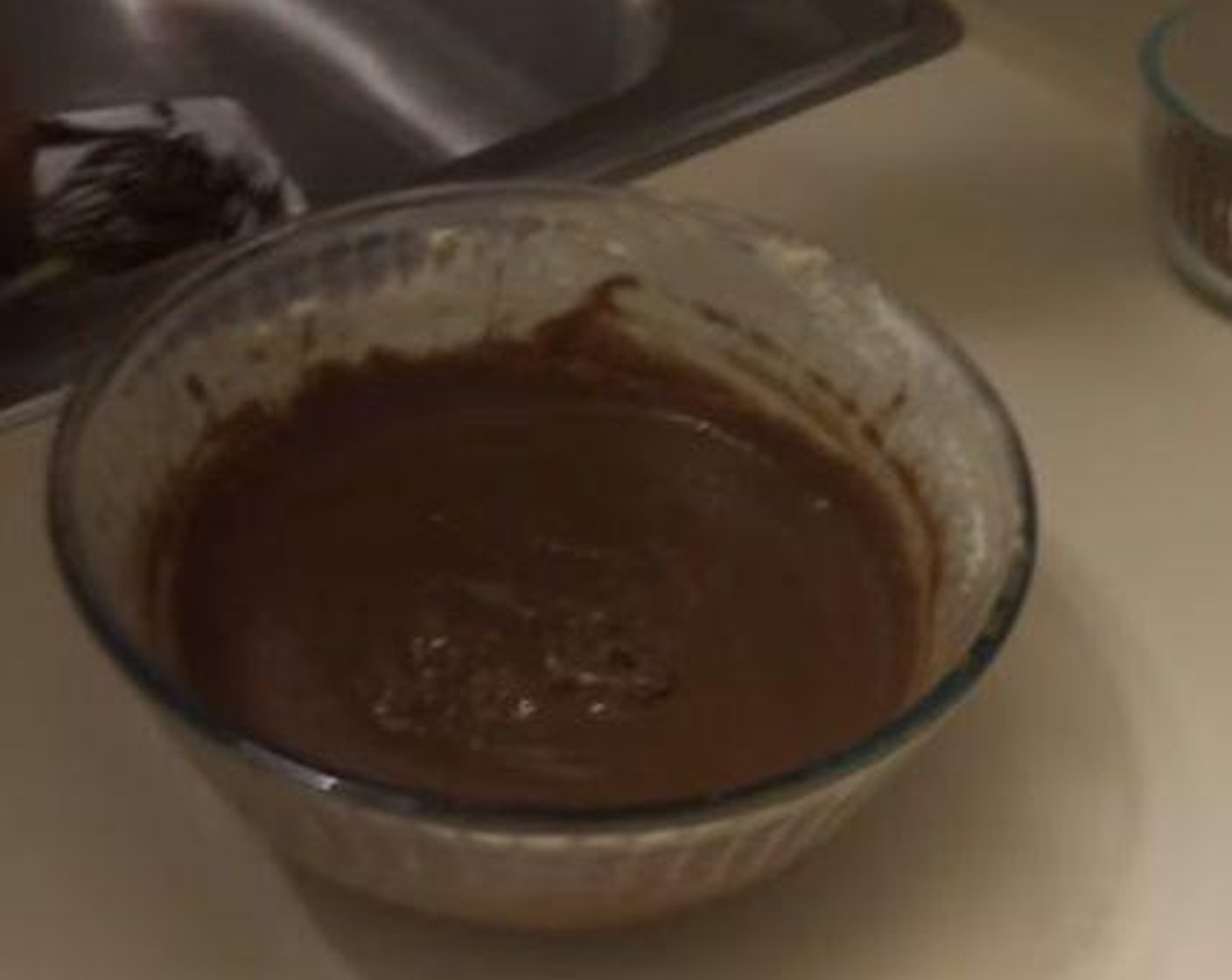 step 2 In a mixing bowl, mix together the Granulated Sugar (1 cup) and Butter (1/2 cup). Then add in the Large Eggs (2), Vanilla Extract (1 tsp), and Semi-Sweet Chocolate Chips (1 1/3 cups), and combine everything well.
