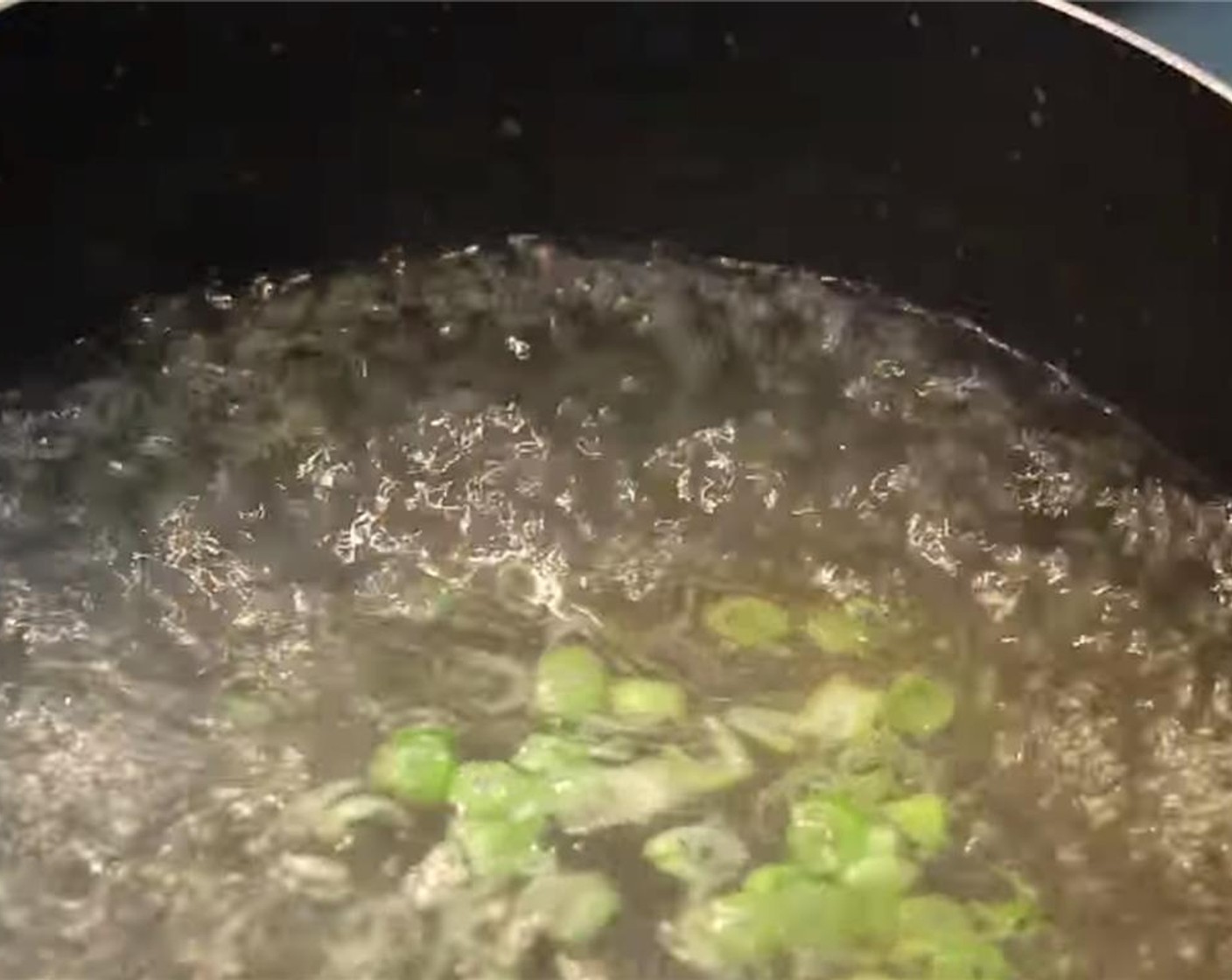 step 9 In a pot, add Water (4 cups), Vegetable Oil (1 tsp), Chicken Bouillon Powder (1 tsp), Salt (1/2 tsp), Granulated Sugar (1/2 tsp), Ground White Pepper (1/8 tsp), 1 tsp sake, Sesame Oil (1/2 tsp), and the chopped green onion.