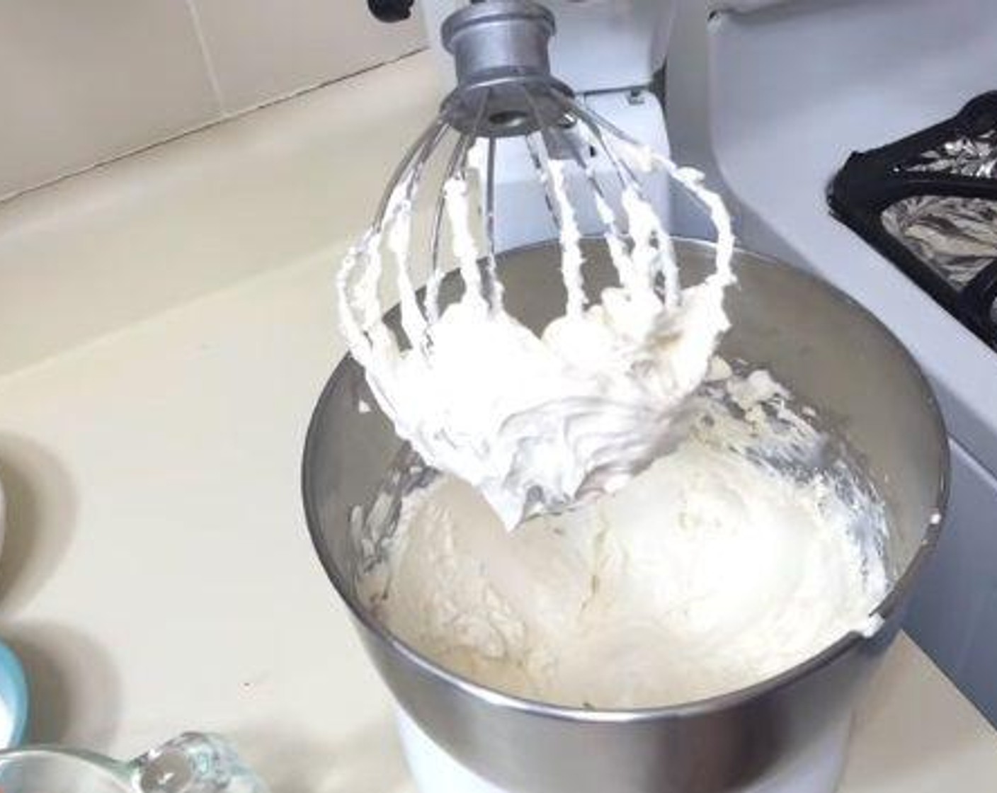 step 2 In a standing mixer, combine together the Cream Cheese (3 1/2 cups), Heavy Cream (2 cups), and Vanilla Extract (2 tsp) until nice and smooth. Then, add in the Granulated Sugar (1/2 cup) and beat everything again.