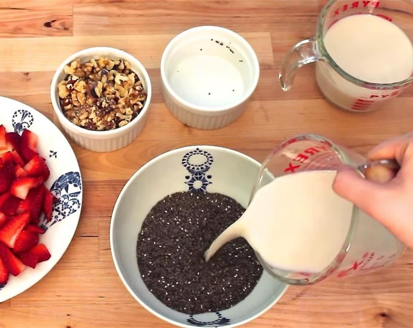 step 1 In a medium sized bowl, combine the Unsweetened Almond Milk (2 cups), Chia Seeds (1/2 cup) and Vegan Honey (2 Tbsp).