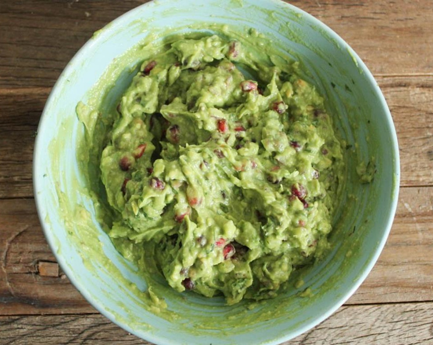 step 5 Mix in the juice from Lemon (1), Pomegranate Seeds (1/2 cup), Pistachios (4 Tbsp), Red Onions (3 Tbsp), and Fresh Cilantro (2 Tbsp).