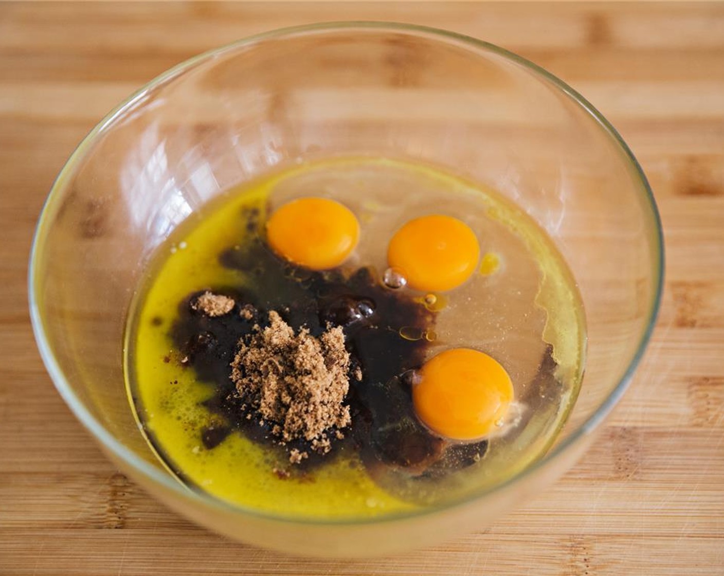 step 3 In a bowl, whisk together Eggs (3), Corn Syrup (1 cup), Dark Brown Sugar (1/2 cup), Vanilla Extract (1 tsp), Butter (4 Tbsp) and Salt (1/2 tsp).