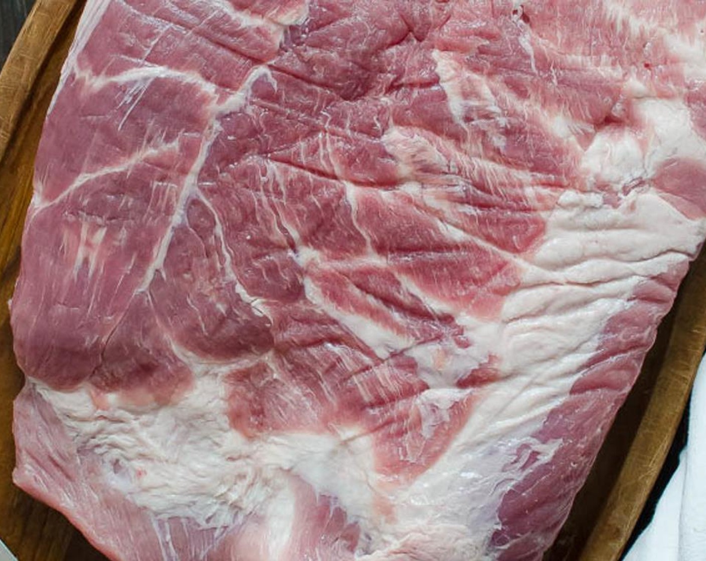 step 2 Rinse the Pork Belly (5 lb) with cool water and pat dry with paper towels.