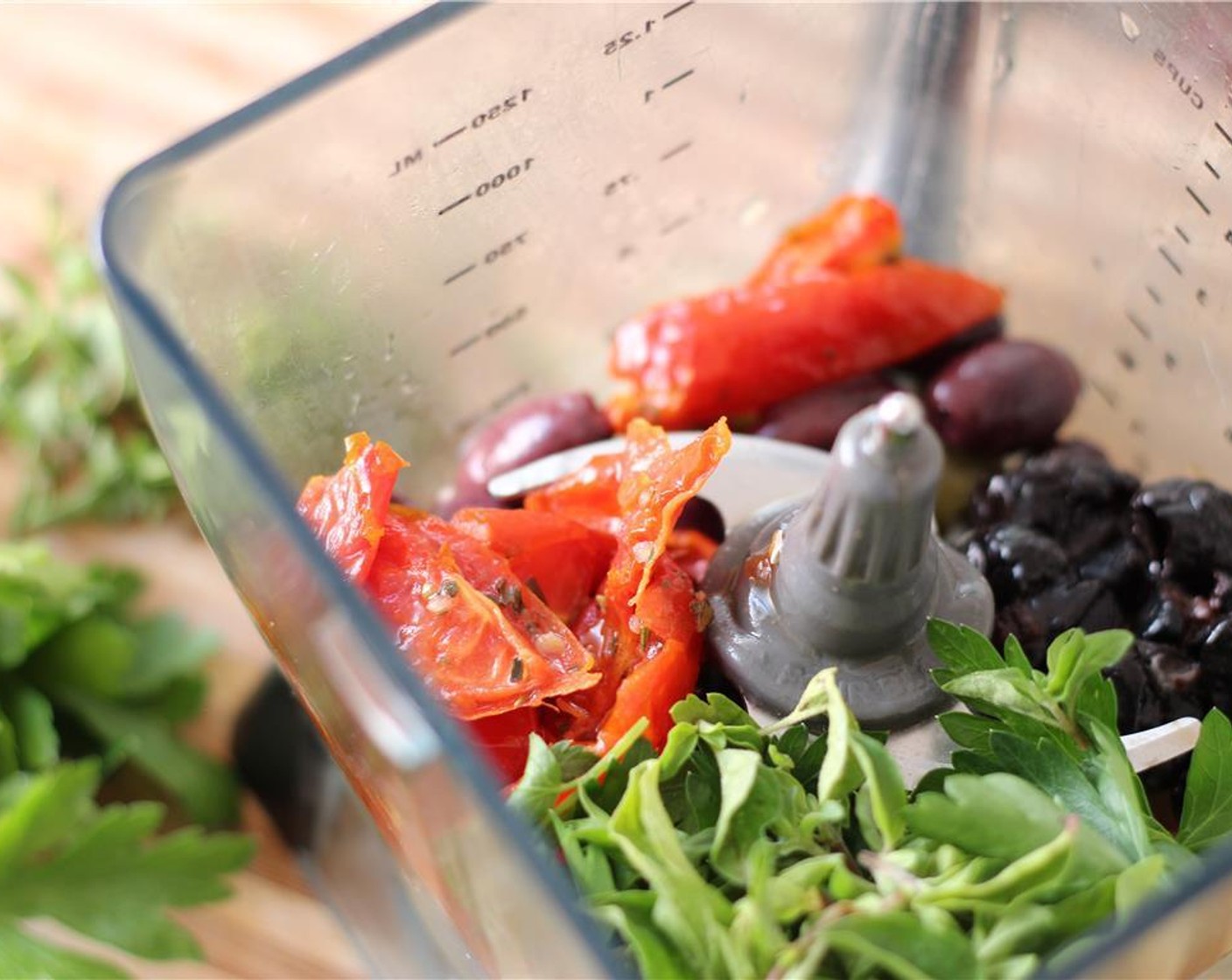step 1 In a food processor, combine Kalamata Olives (1/2 cup), Green Olives (4 Tbsp), Beldi Olives (4 Tbsp), Roasted Tomatoes (4 Tbsp), Garlic (2 cloves), Fresh Parsley (2 Tbsp), Fresh Oregano (1 Tbsp), 2 Tbsp of juice from Lemon (1) and Olive Oil (2 Tbsp).