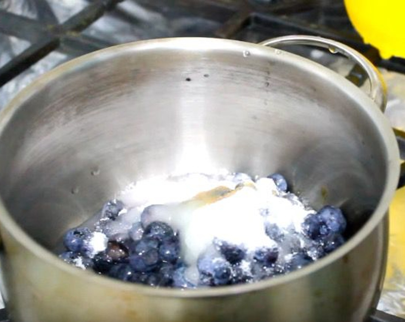 step 11 In a saucepan, add Fresh Blueberries (2 cups), Granulated Sugar (1/3 cup), Vanilla Extract (1/4 tsp), Water (4 Tbsp), and juice from Lemon (1). Bring mixture to a boil. Reduce heat to low and cook for 15 minutes.