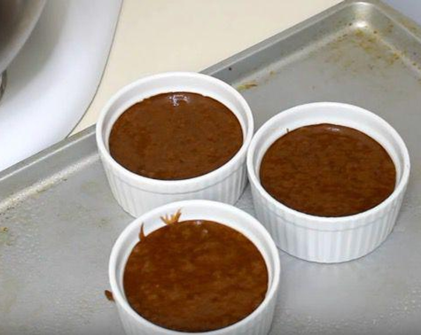 step 5 Fill each ramekin with lava cake batter, about 2/3 of the way up. Bake them for 10-12 minutes.