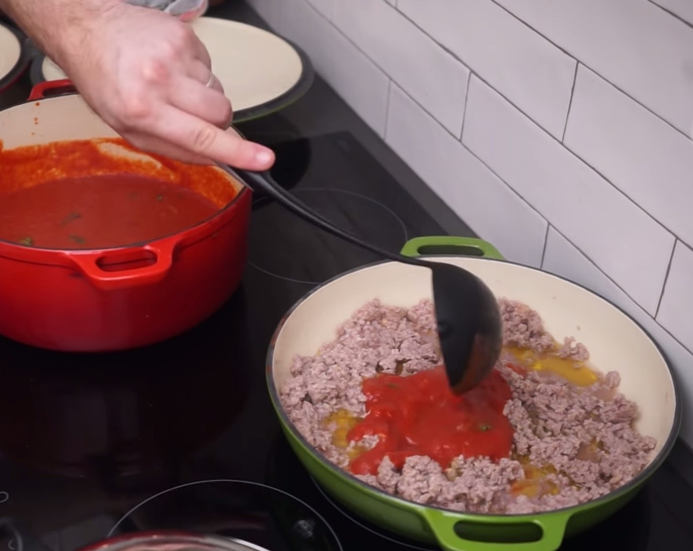 step 9 At this point, your mince and sauce for the pasta al forno are ready! Add two ladles of sauce into the mince and mix through.