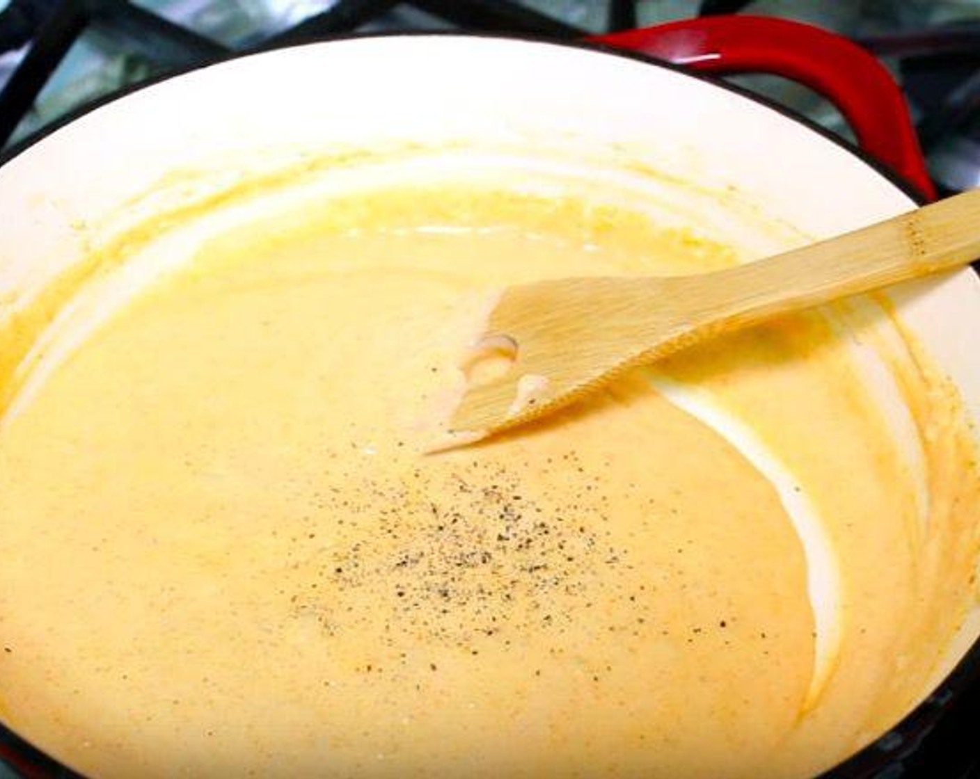 step 2 In a saucepan, melt Butter (4 Tbsp). Add All-Purpose Flour (4 Tbsp), whisking well. Add Whole Milk (2 1/4 cups), Garlic Powder (1 tsp), Onion Powder (1/2 tsp), and Paprika (1/2 tsp). Stir until the mixture thickens. Season with Salt (to taste), and Ground Black Pepper (to taste).