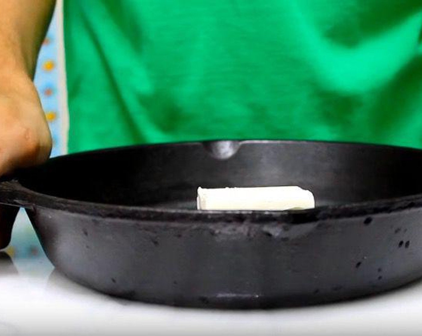 step 2 In a cast-iron skillet, add Butter (4 Tbsp) Place in oven until melted.