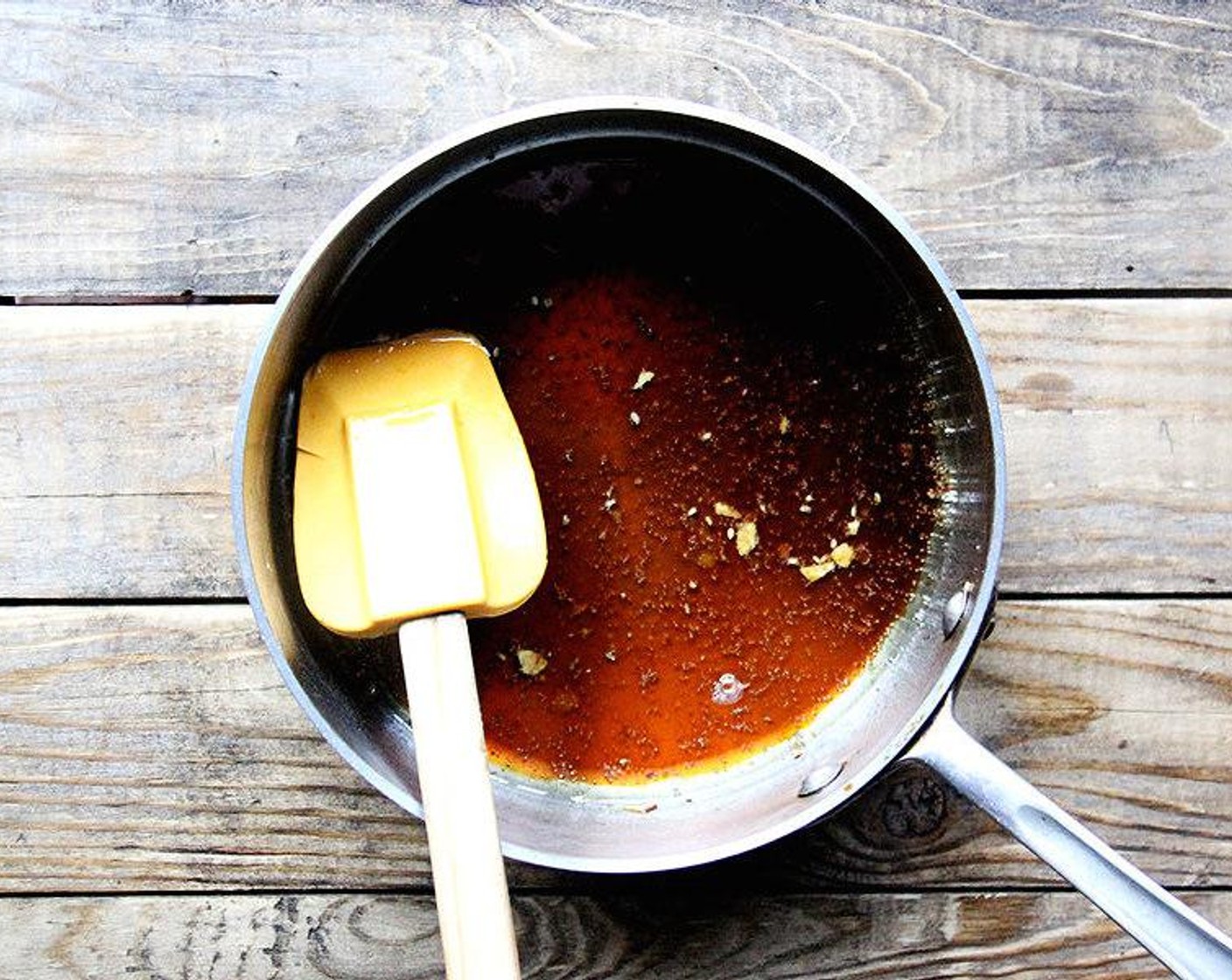 step 4 In the same saucepan, bring the Granulated Sugar (3 Tbsp), Grapeseed Oil (4 Tbsp), Rice Vinegar (2 Tbsp), and Soy Sauce (2 Tbsp) to a boil, and whisk until sugar is dissolved. Add Scallion (1 bunch) and remove from heat. Dressing can be used while warm or cool.