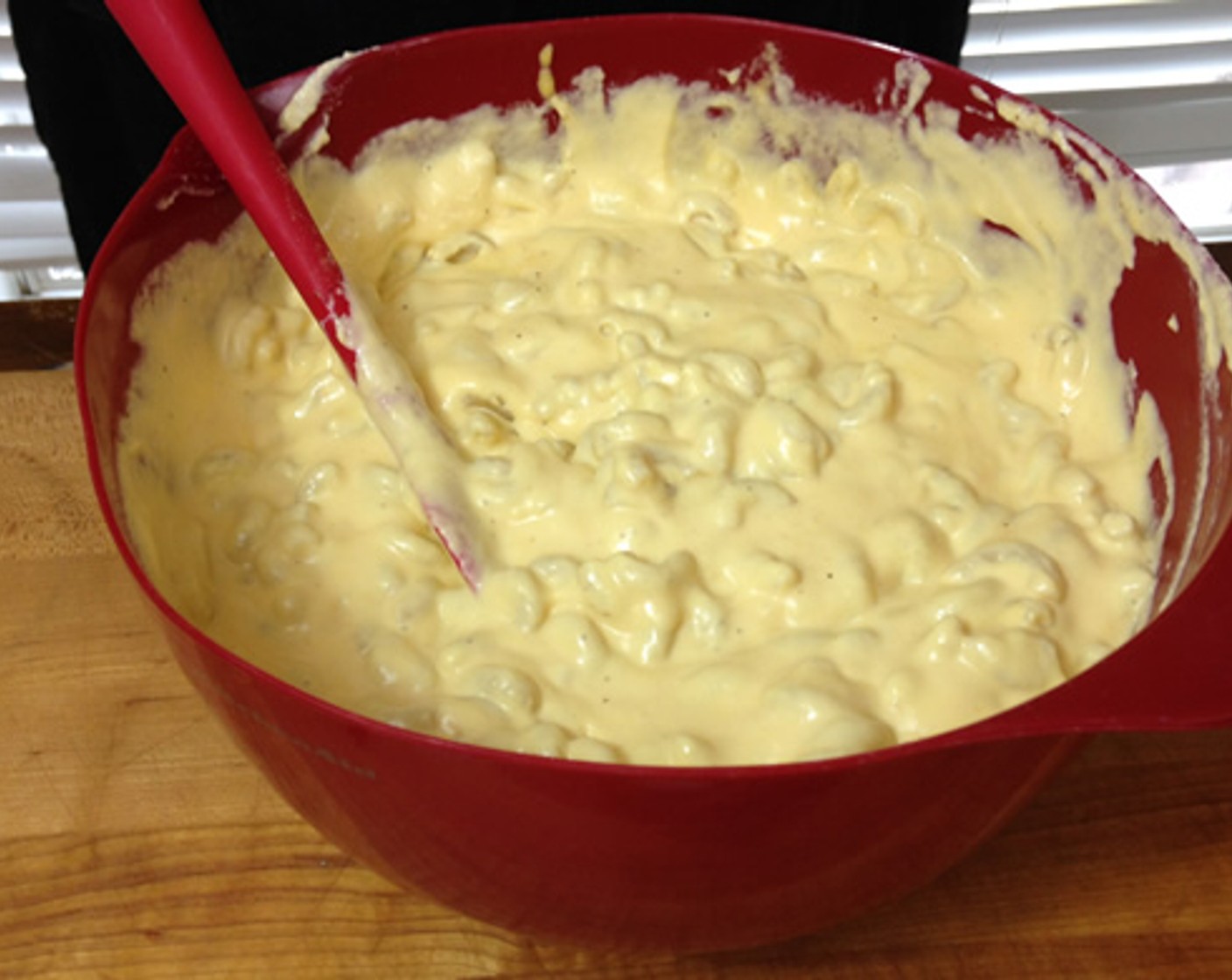 step 7 Add grated cheese to sauce slowly stirring until the cheese is blended and sauce is smooth and creamy. Add Hot Sauce (1 Tbsp) and All-Purpose Seasoning (2 tsp).