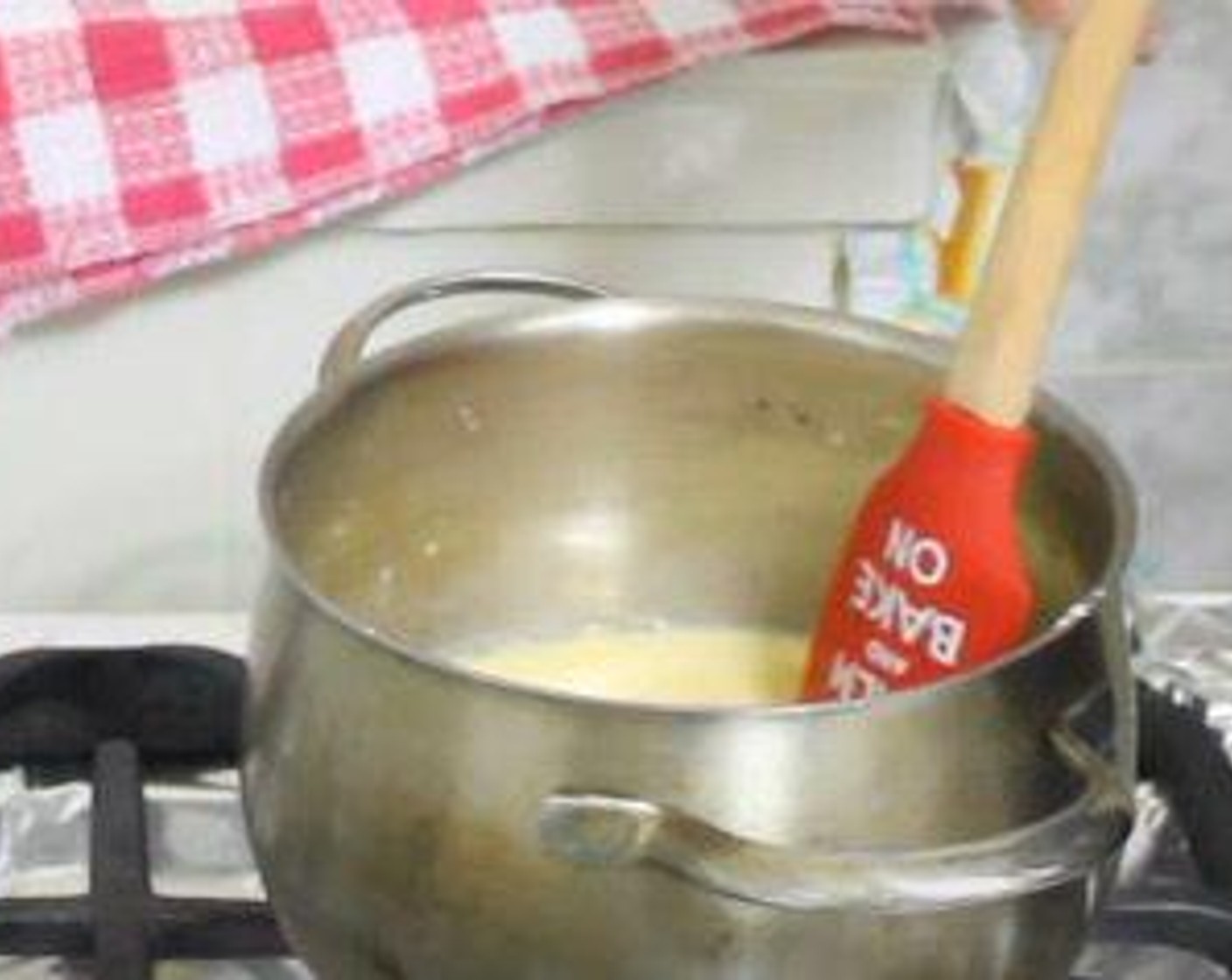 step 1 In a heavy-bottomed saucepan over medium-high heat, add Whole Milk (2 cups), Eggs (4), Granulated Sugar (1/2 cup), Vanilla Extract (2 tsp), Corn Starch (4 Tbsp), and Salt (1 pinch). Whisk together. Cook for 3-8 minutes, or until mixture thickens.