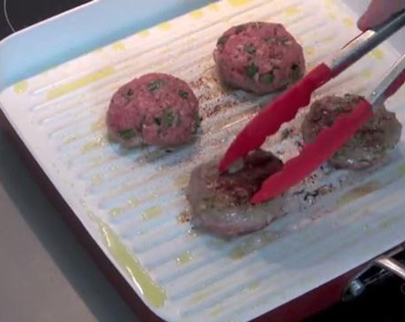 step 3 Brush some Olive Oil (as needed) over a frying pan. Put your patties in, and fry them for about 4-5 minutes. Make sure to flip them over once in a while so that they are evenly cooked on both sides.