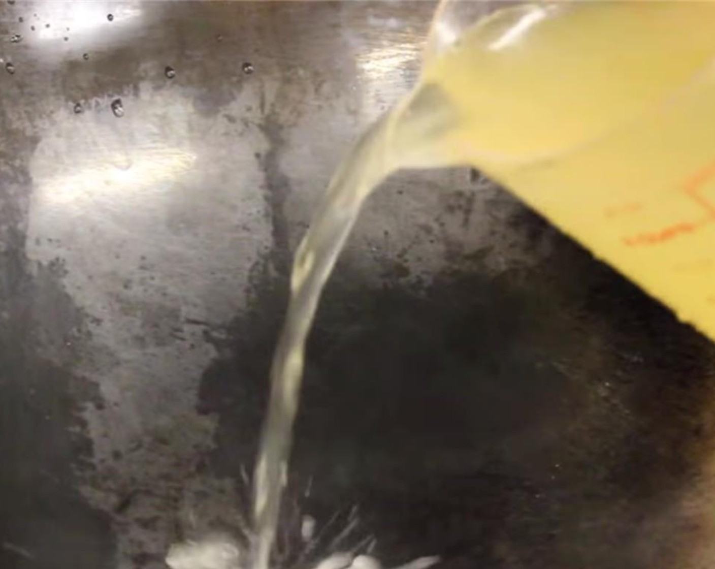 step 1 Add Low-Sodium Chicken Stock (2 cups) in a heated wok or pan. Turn heat to medium.