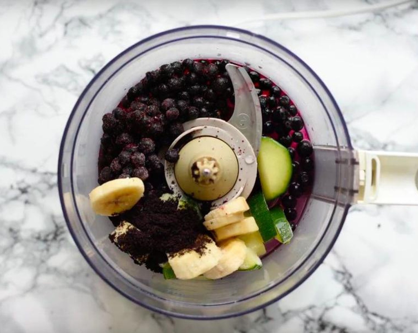 step 1 Blend Açai Powder (1 Tbsp), Banana (1/3 cup), Zucchini (1/3 cup), Fresh Blueberry (2/3 cup), and Cashew Milk (1 2/3 Tbsp) all together.