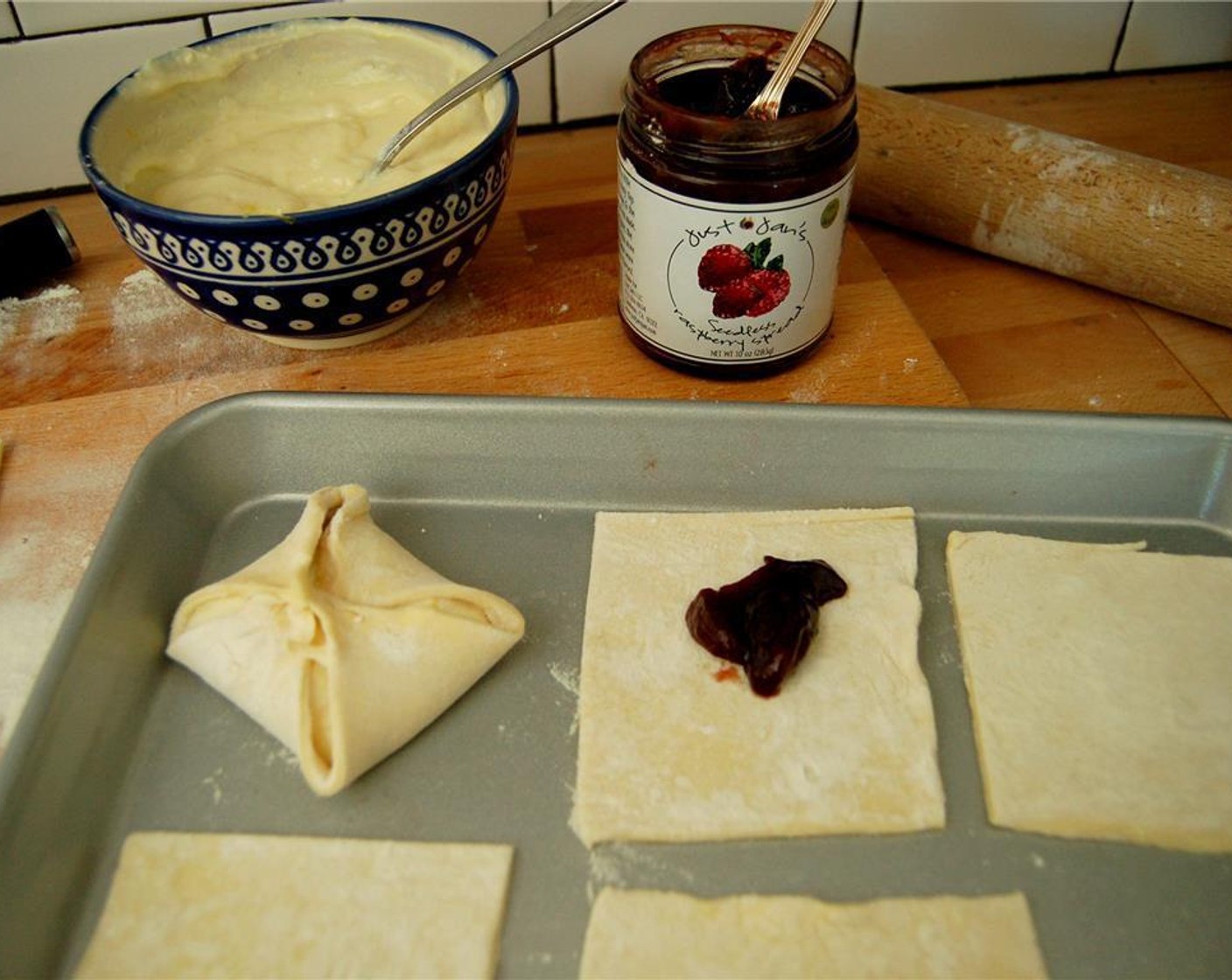 step 5 Put 1 teaspoon of Just Jan’s® Fruit Spread (to taste) and one teaspoon of the cheese mixture on each pastry square.