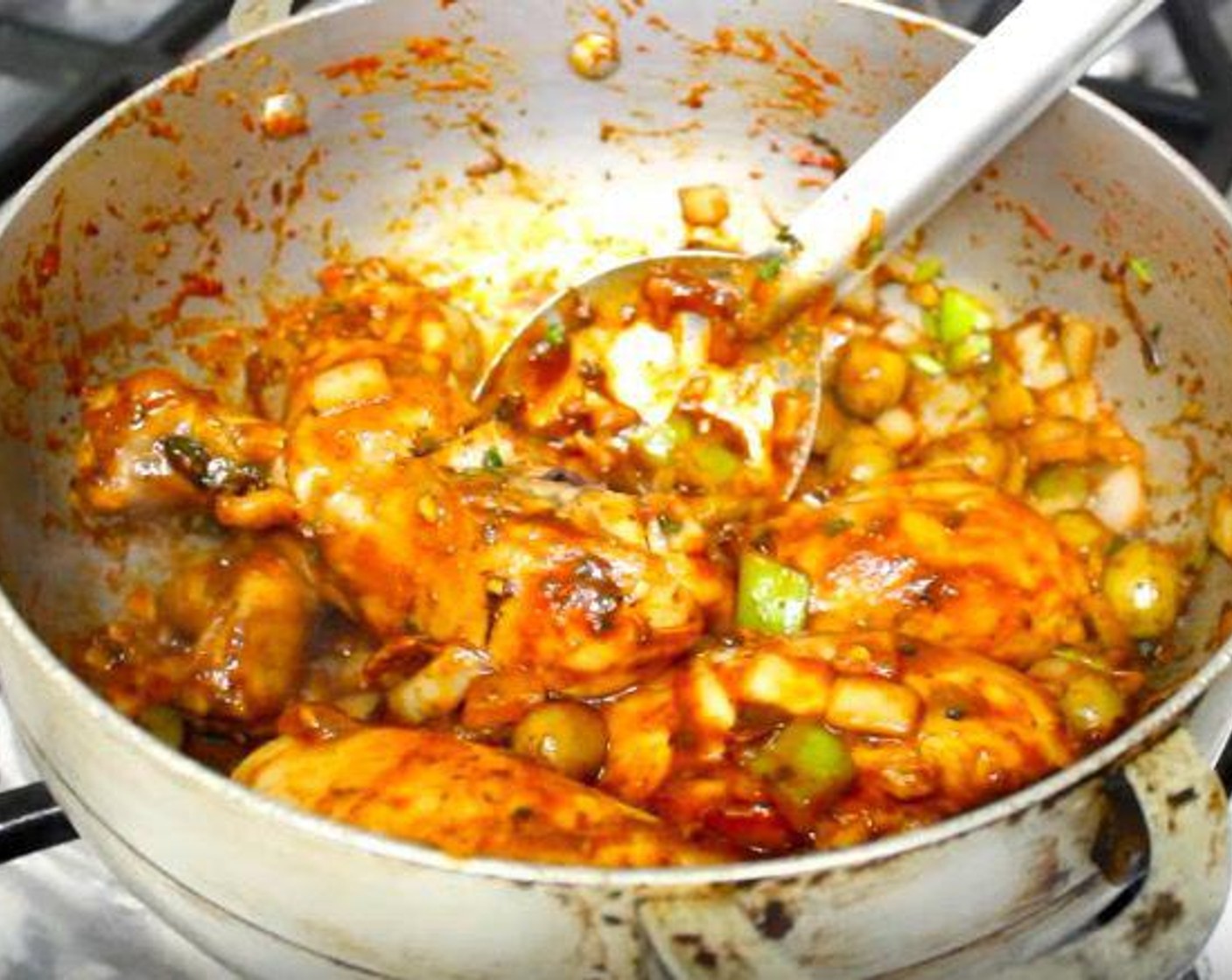 step 4 Add the vegetables, Chicken Bouillon Cubes (2) and Tomato Paste (3 Tbsp). Mix until well combined.