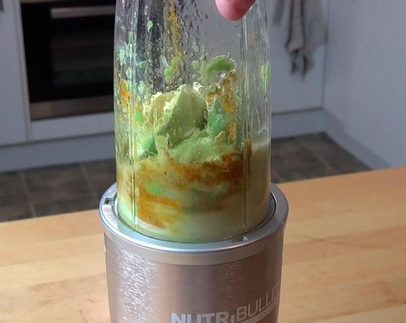 step 2 Scoop out the Avocados (2) into a mixer. Add Olive Oil (4 Tbsp), Freshly Squeezed Lemon (1), Ground Cumin (1 tsp), Ground Turmeric (1/4 tsp), Salt (to taste), and Ground Black Pepper (to taste). Use the mixer to create the sauce.