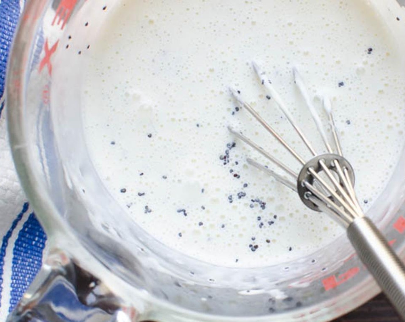 step 1 In a 2 cup glass measuring cup or bowl, combine the Onions (2 Tbsp), Granulated Sugar (1 tsp), Poppy Seeds (1 tsp), White Wine Vinegar (1 1/2 Tbsp), Mayonnaise (1/2 cup), Buttermilk (3/4 cup), zest and juice from Lemon (1).