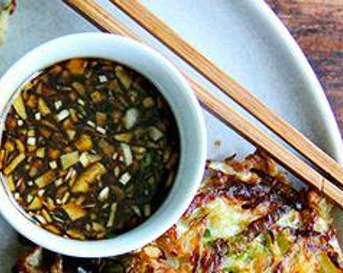 step 3 Make the sauce: In a small bowl, combine Soy Sauce (4 Tbsp), Rice Vinegar (2 Tbsp), Mirin (2 Tbsp), Sriracha (1 tsp), Sesame Oil (1/2 tsp), Granulated Sugar (1 tsp) and Water (1 Tbsp). Set aside.