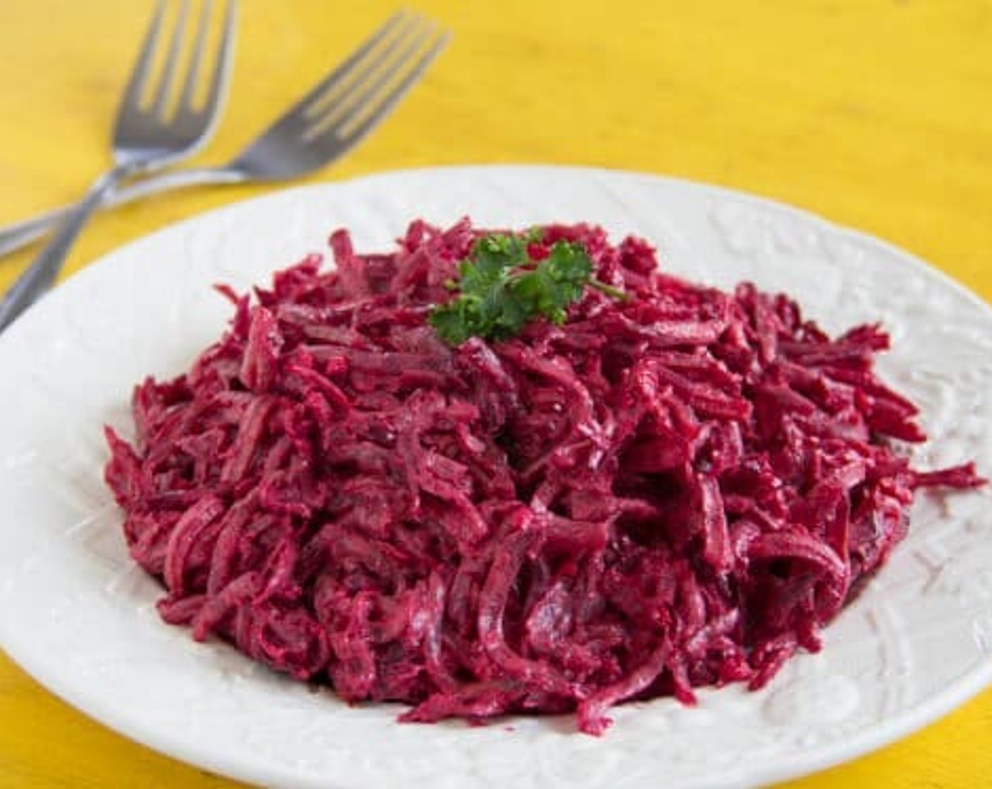 step 4 In a medium bowl, combined grated beets, Sour Cream (4 Tbsp), Mayonnaise (2 Tbsp) and minced garlic. Season Salt (to taste) and Ground Black Pepper (to taste).