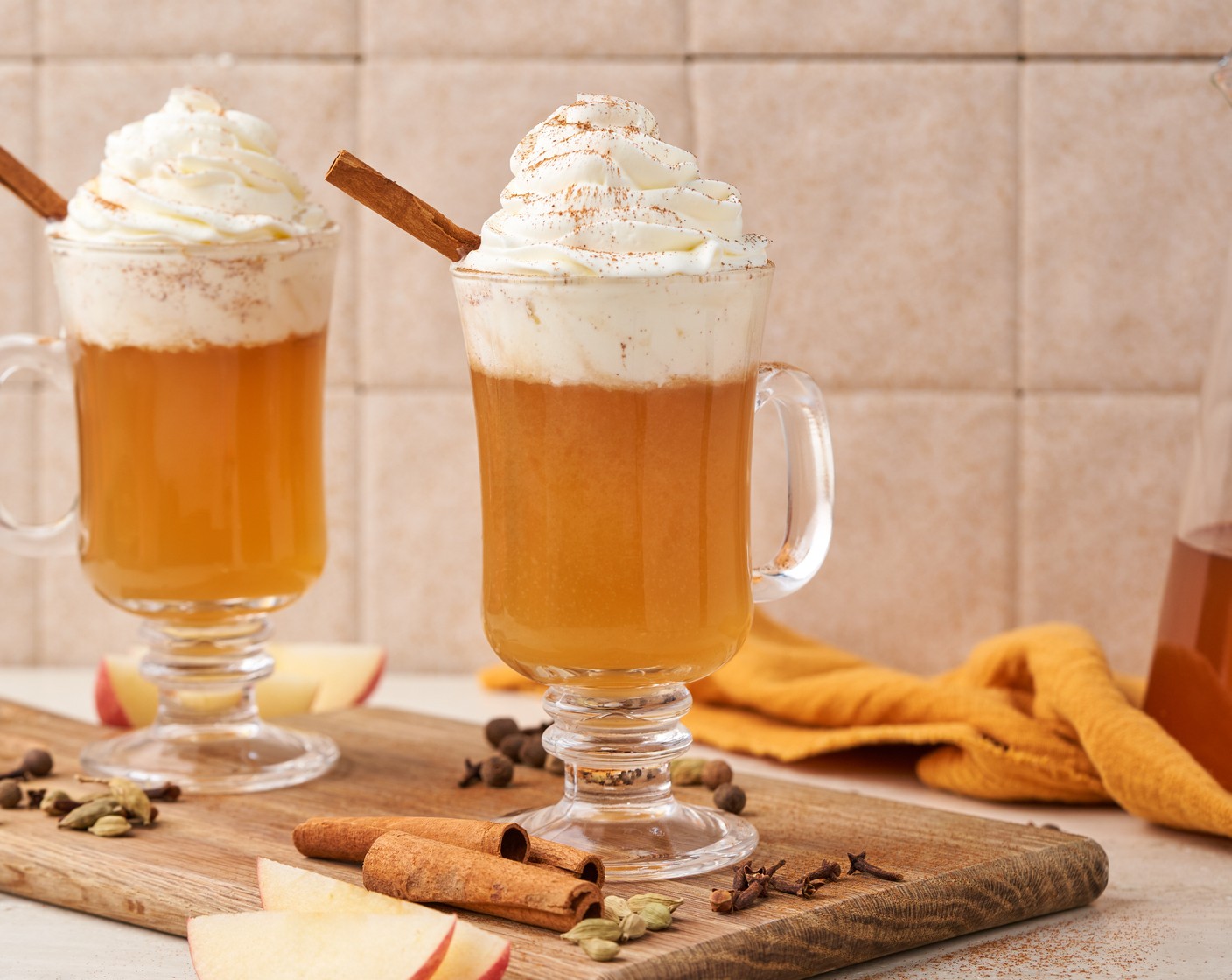 step 3 Serve warm in a heatproof glass, serve with Whipped Cream (to taste) on top, and garnish with Cinnamon Sticks (to taste) and Ground Cinnamon (to taste).