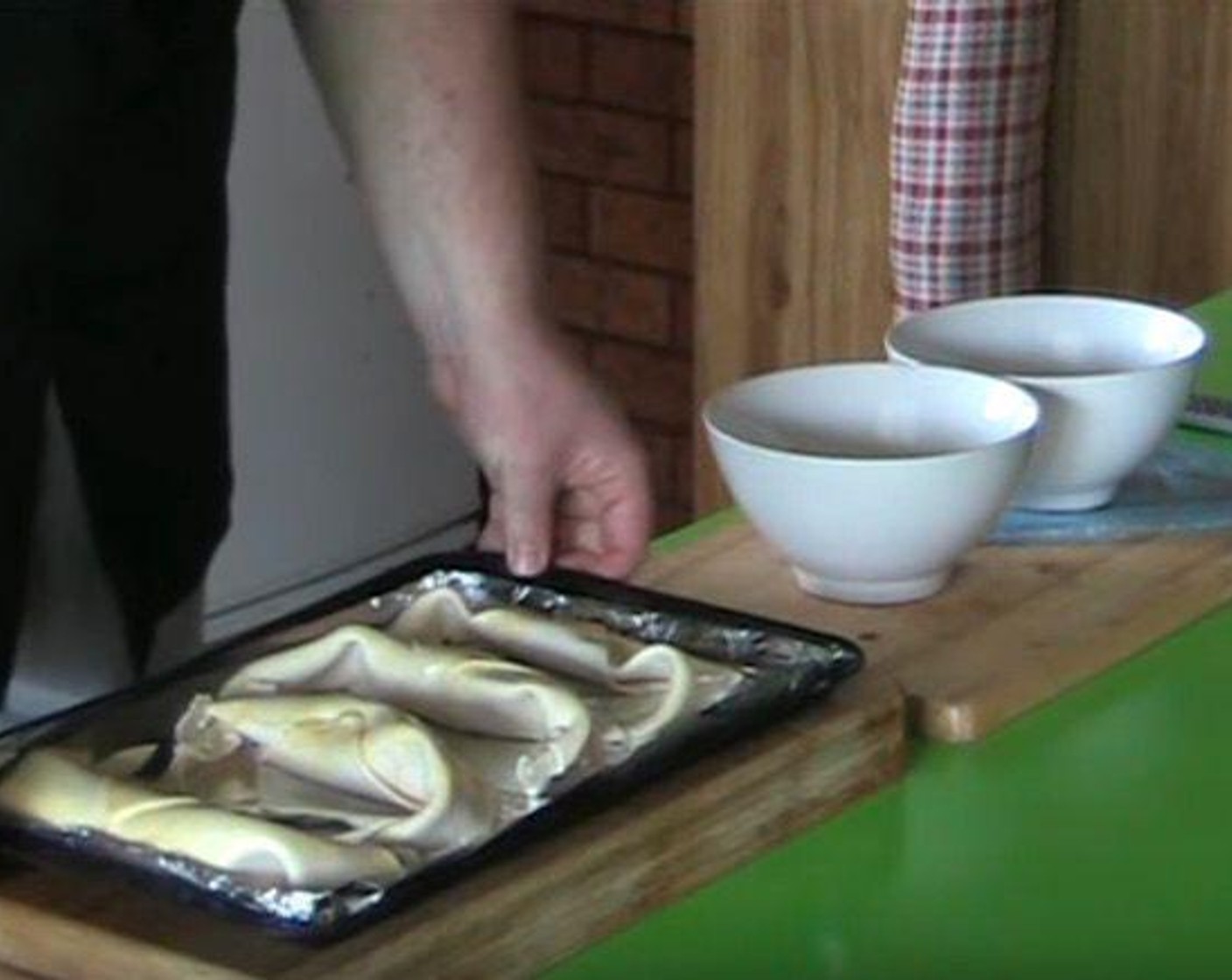 step 3 Brush croissants with the egg wash. Bake at 180 degrees C (350 degrees F) for 10-15 minutes, or until golden and puffed.