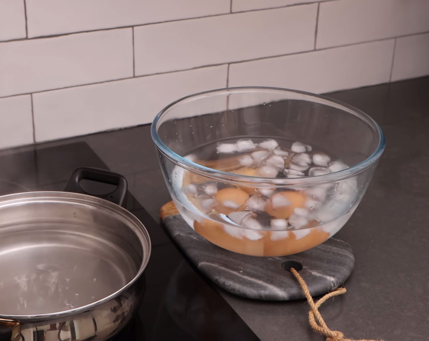 step 12 After 14 minutes, drop the eggs into a bowl of water with Ice (as needed) so they stop cooking and don’t go dark in the middle.