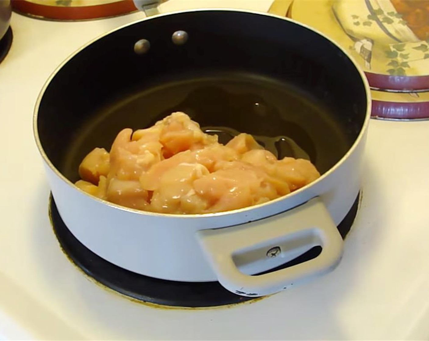 step 2 Meanwhile, heat Oil (1 Tbsp) in a large skillet on medium-high heat. Add Boneless, Skinless Chicken Breast (1 lb) and cook for 6 minutes, stirring occasionally so chicken cooks evenly.