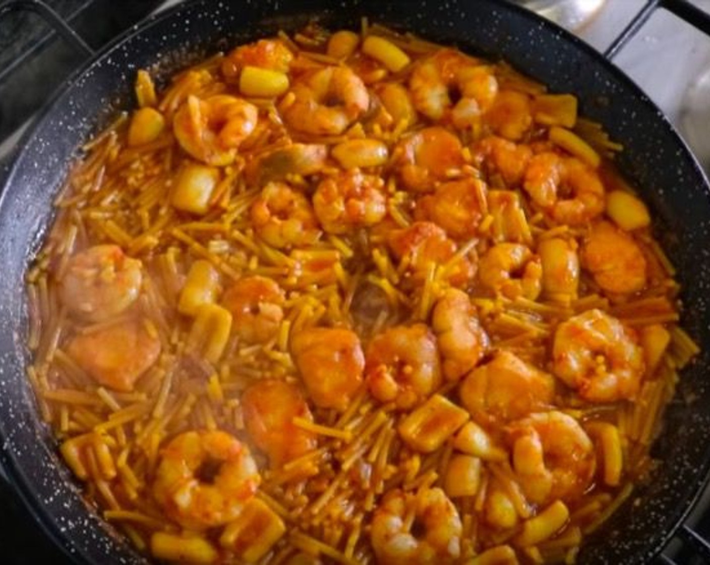 step 14 Lower the temperature to a low-medium heat and simmer for 3 minutes to reduce the broth.