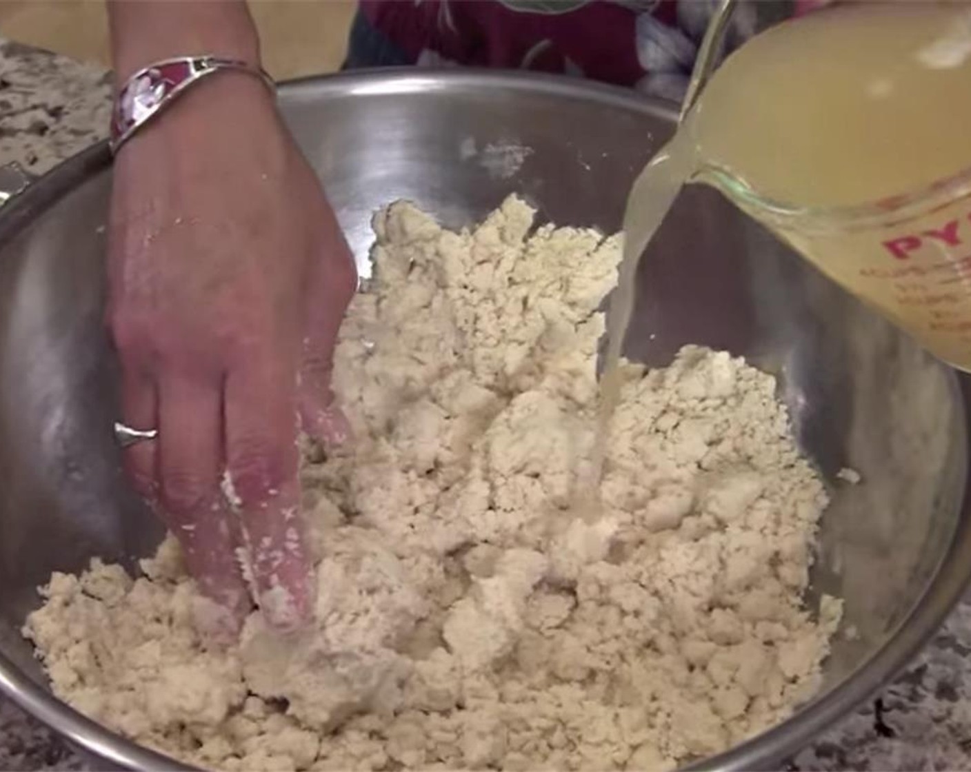 step 6 Put Maseca Instant Corn Masa Mix (4 cups), Sea Salt (1 Tbsp), and Garlic Powder (1/2 tsp) in a large bowl, and combine. Then, add Corn Oil (1 cup) and mix with your hands. Add the Chicken Broth (2 1/2 cups), 1/2 cup at a time.