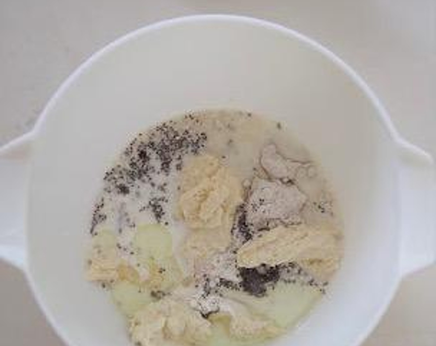 step 4 Put Salt (1 tsp), Bread Flour (1 cup), Rye Flour (3/4 cup), Instant Dry Yeast (1/2 tsp), Brown Sugar (1 1/2 Tbsp), Olive Oil (0.5 oz), Water (1/2 cup), Cream (3.5 oz), Toasted Sunflower Seeds (3 Tbsp) and sponge dough into the bowl of a stand mixer. Using the dough hook, knead until the dough comes together, becoming elastic and tacky but not sticky, around 12-15 minutes at medium speed.