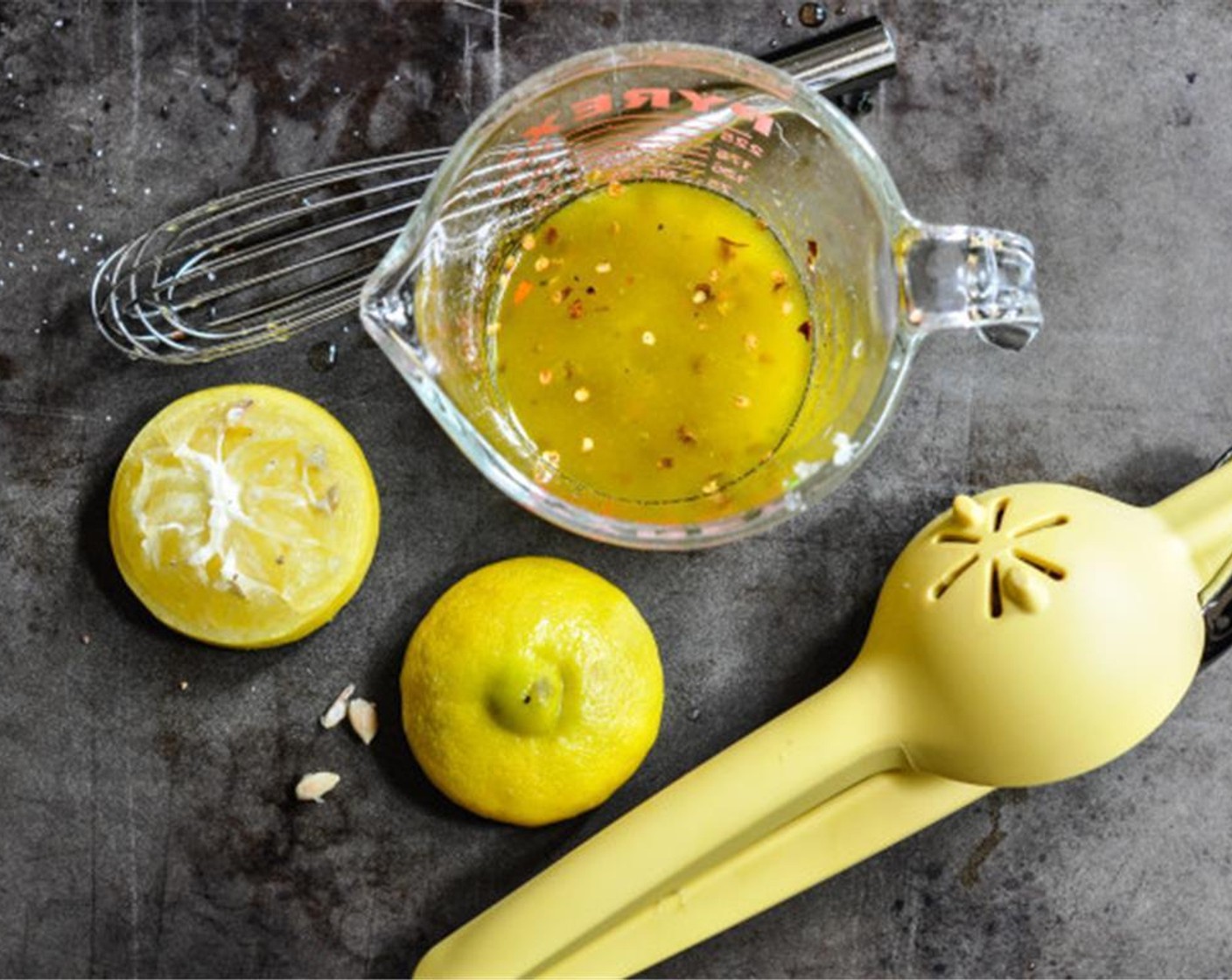 step 3 Whisk together Extra-Virgin Olive Oil (3 Tbsp), garlic, Salt (1 pinch), Ground Black Pepper (1 pinch), lemon juice and Crushed Red Pepper Flakes (1 pinch).