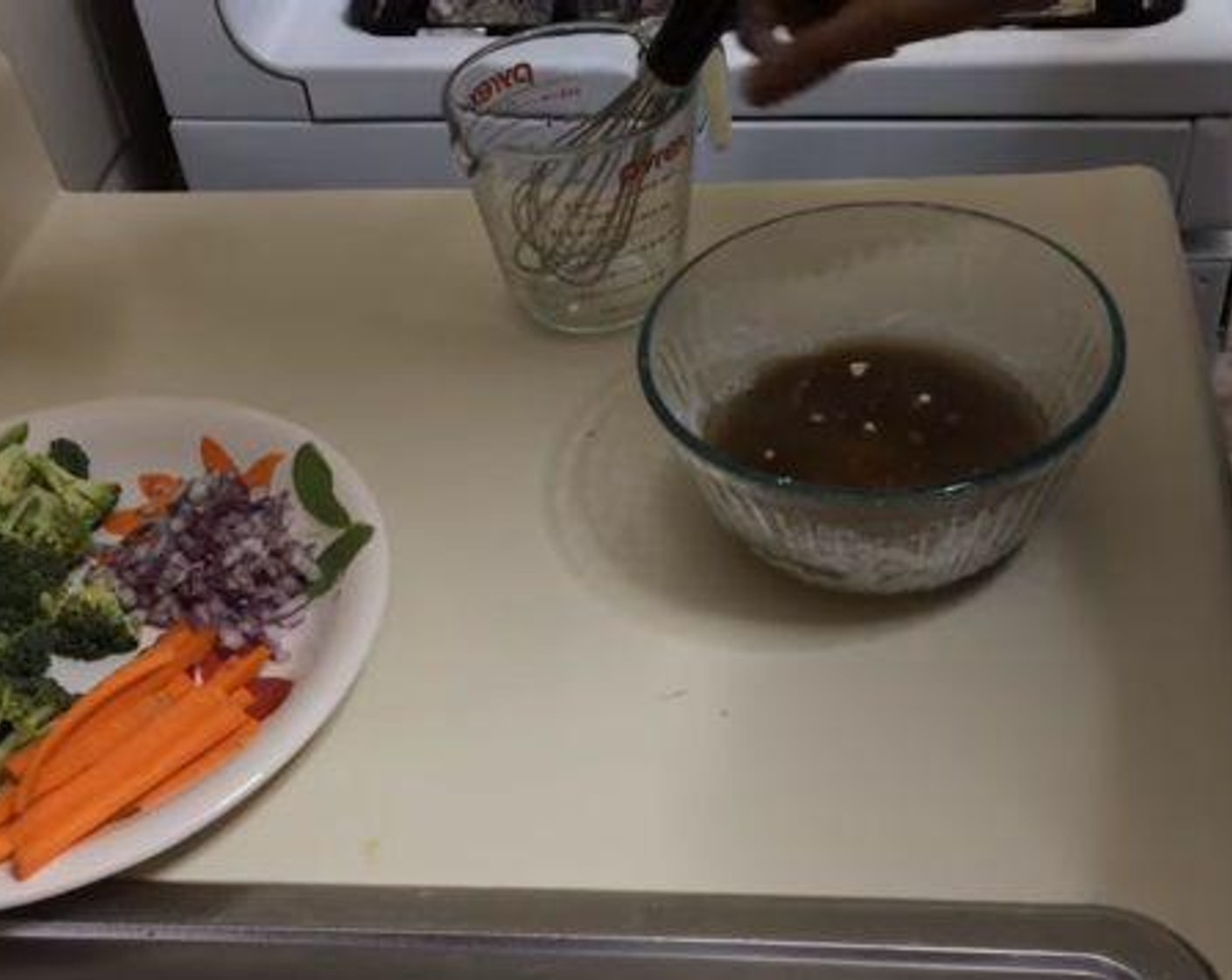 step 2 Then in a separate bowl, mix together the Low-Sodium Chicken Broth (1 cup) Honey (4 Tbsp), Fresh Ginger (1/4 tsp), Garlic (2 cloves) and Soy Sauce (4 Tbsp).