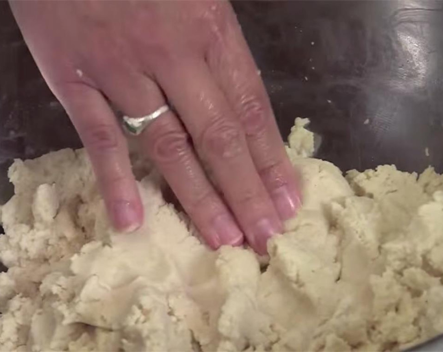 step 7 Continue to mix with your hands, adding more chicken broth until mixture reaches the consistency of cookie dough that can be spread with a knife or spreader. If you add too much liquid, just add a little more masa to thicken.