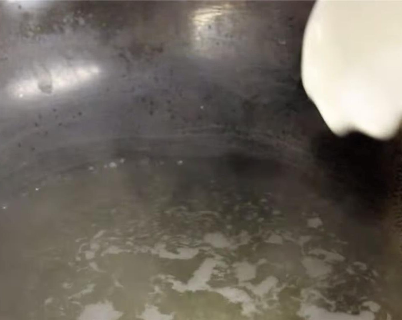 step 4 Add the slurry to the heated broth while its still warm and stir immediately. The soup should thicken once it comes to a boil. Add Sherry Wine (1 tsp). Once it comes to a boil, turn off the fire.