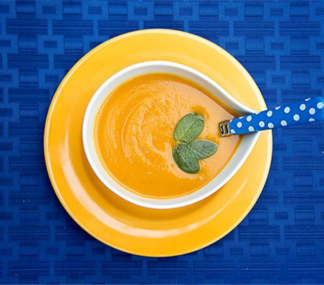 Creamy butternut squash soup with apple, a cozy fall soup idea.