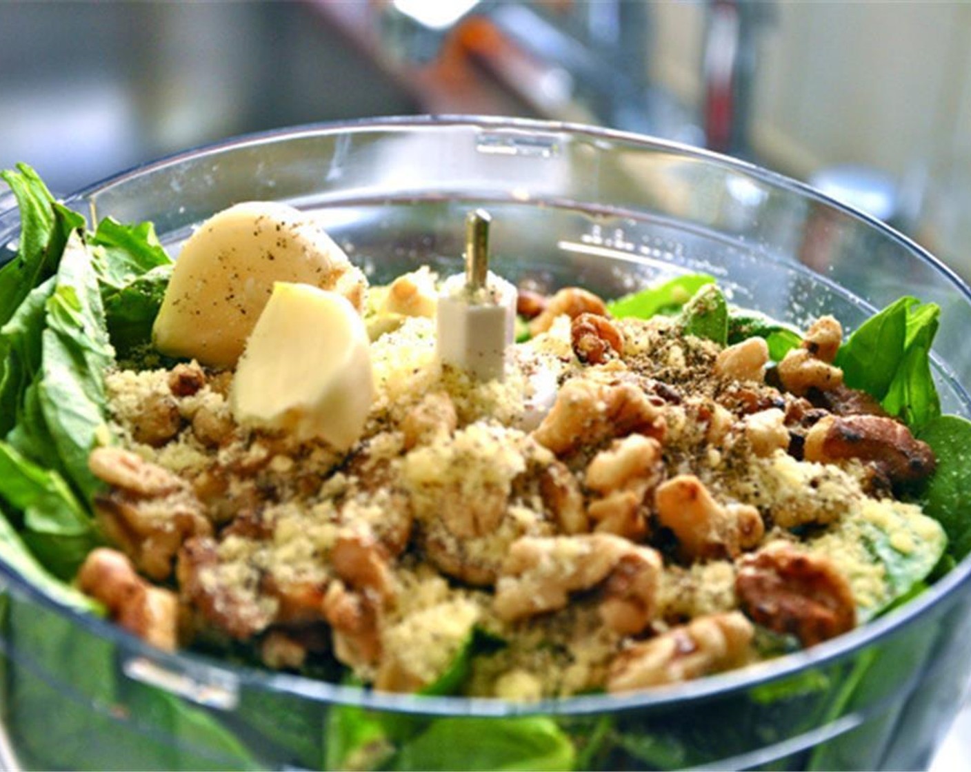 step 3 In a food processor, place the large bag of Fresh Baby Spinach (9 1/2 cups), Fresh Basil (1 bunch), Walnut (1/2 cup), Garlic (2 cloves), Salt (to taste), and Ground Black Pepper (to taste) and Parmesan Cheese (4 Tbsp).
