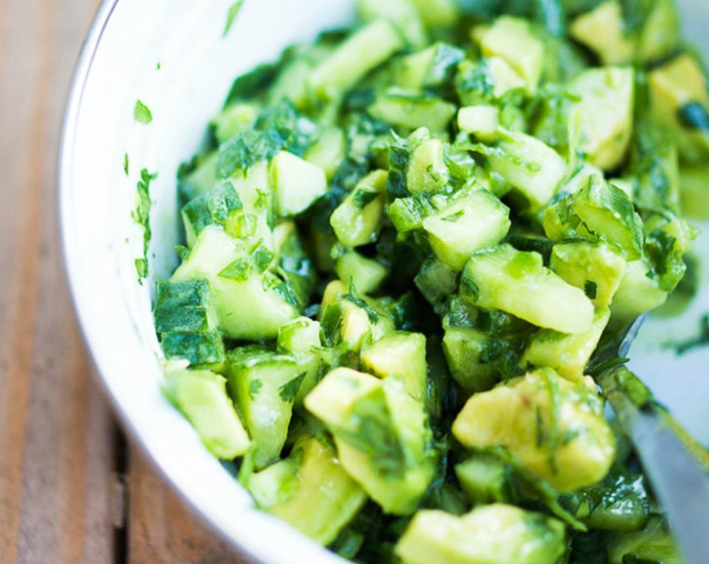 step 5 Make the salsa, in a medium bowl, mix the Cucumber (1 cup), Fresh Cilantro (2 Tbsp), zest and juice of the Lime (1), Jalapeño Pepper (1/2), Olive Oil (2 tsp) and Salt (1/4 tsp), and Ground Black Pepper (1/4 tsp). Then gently fold in the Avocado (1).