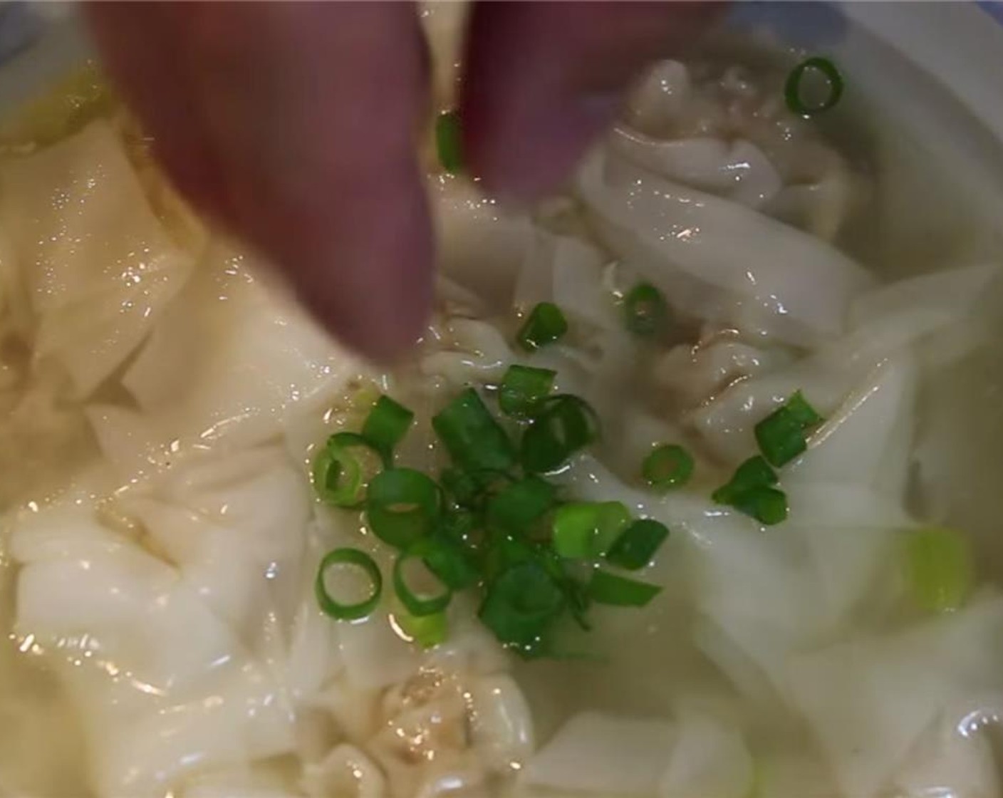 step 11 After 4 minutes, turn off the heat and add in Distilled White Vinegar (2 tsp). Serve into bowls. Garnish with the chopped green onion.