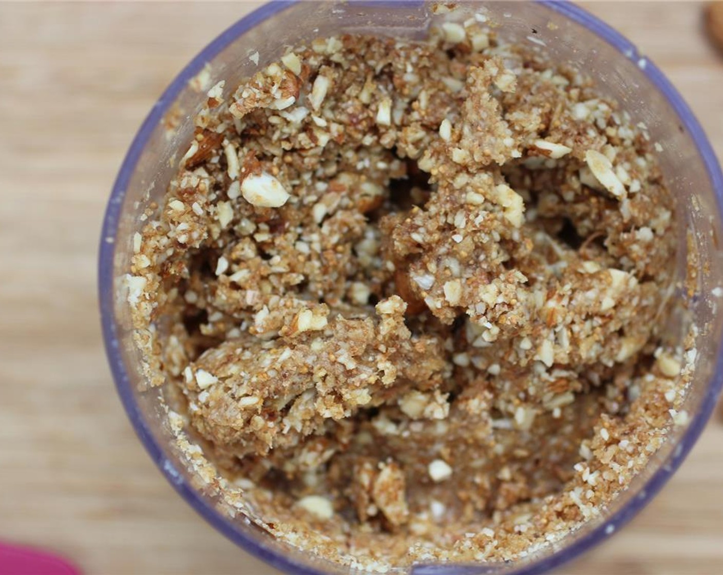 step 2 To make the crust, add Raw Almonds (1 cup), Dried Fig (3/4 cup), Water (1 tsp), and dates to a food processor and mix to combine.
