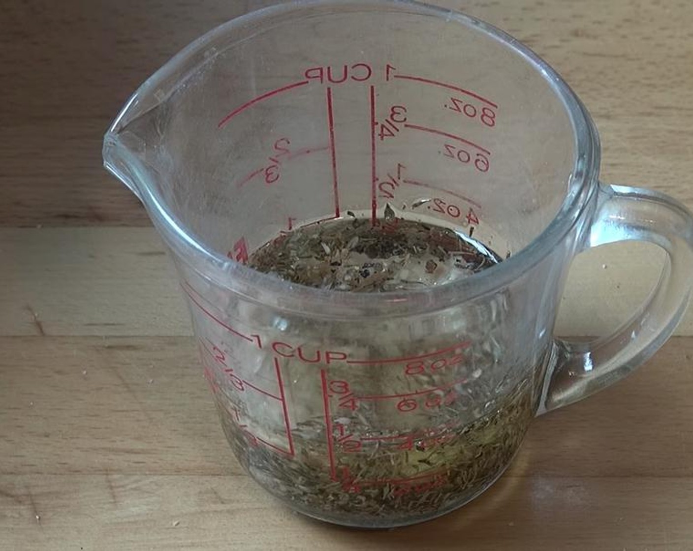 step 2 Mix together Olive Oil (4 Tbsp), Dried Thyme (1 tsp), Dried Oregano (1 tsp), Salt (to taste), Ground Black Pepper (to taste), and Garlic (3 cloves).