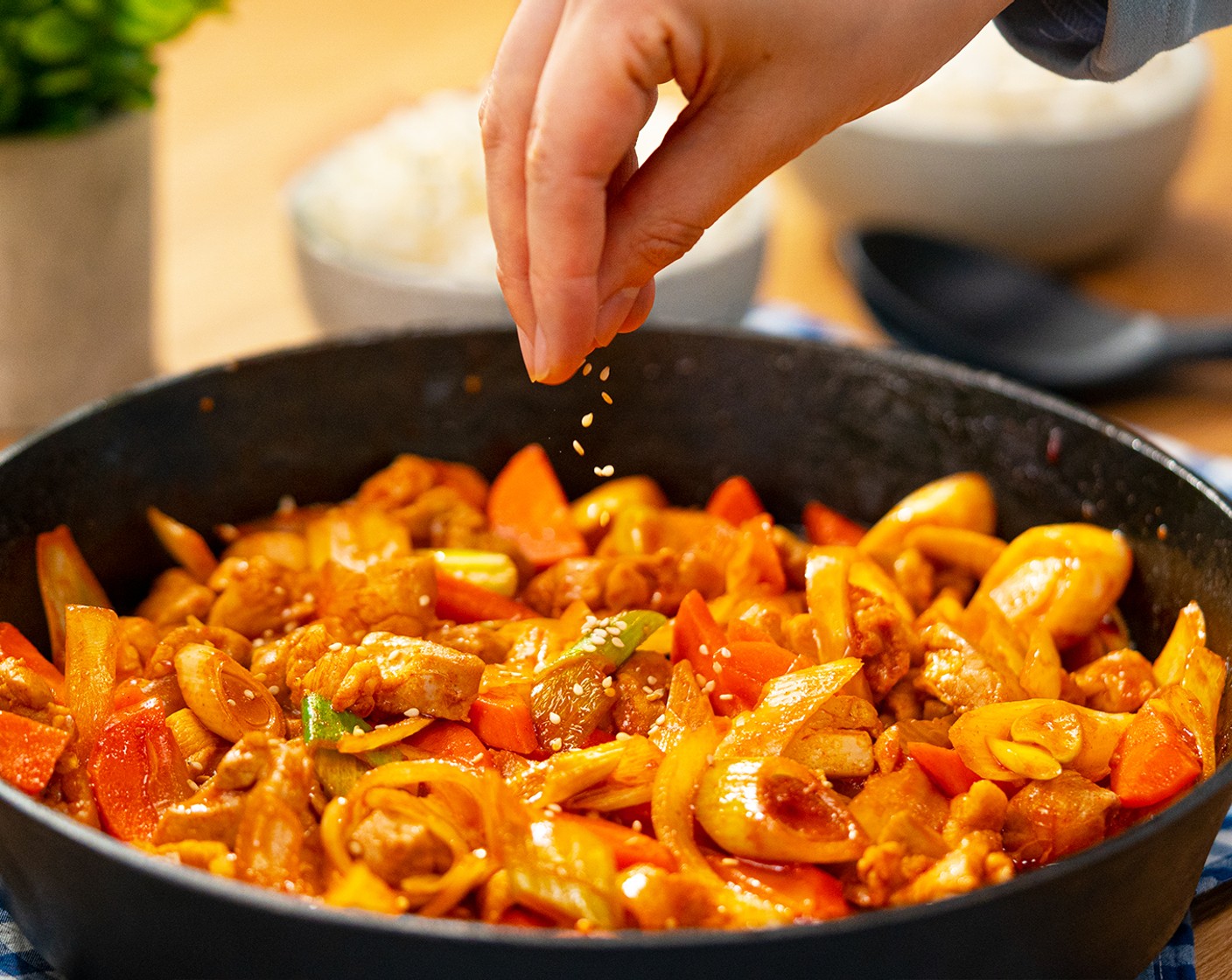 step 6 Optionally garnish with Sesame Seeds (to taste). Serve warm with Rice (to taste) if desired.