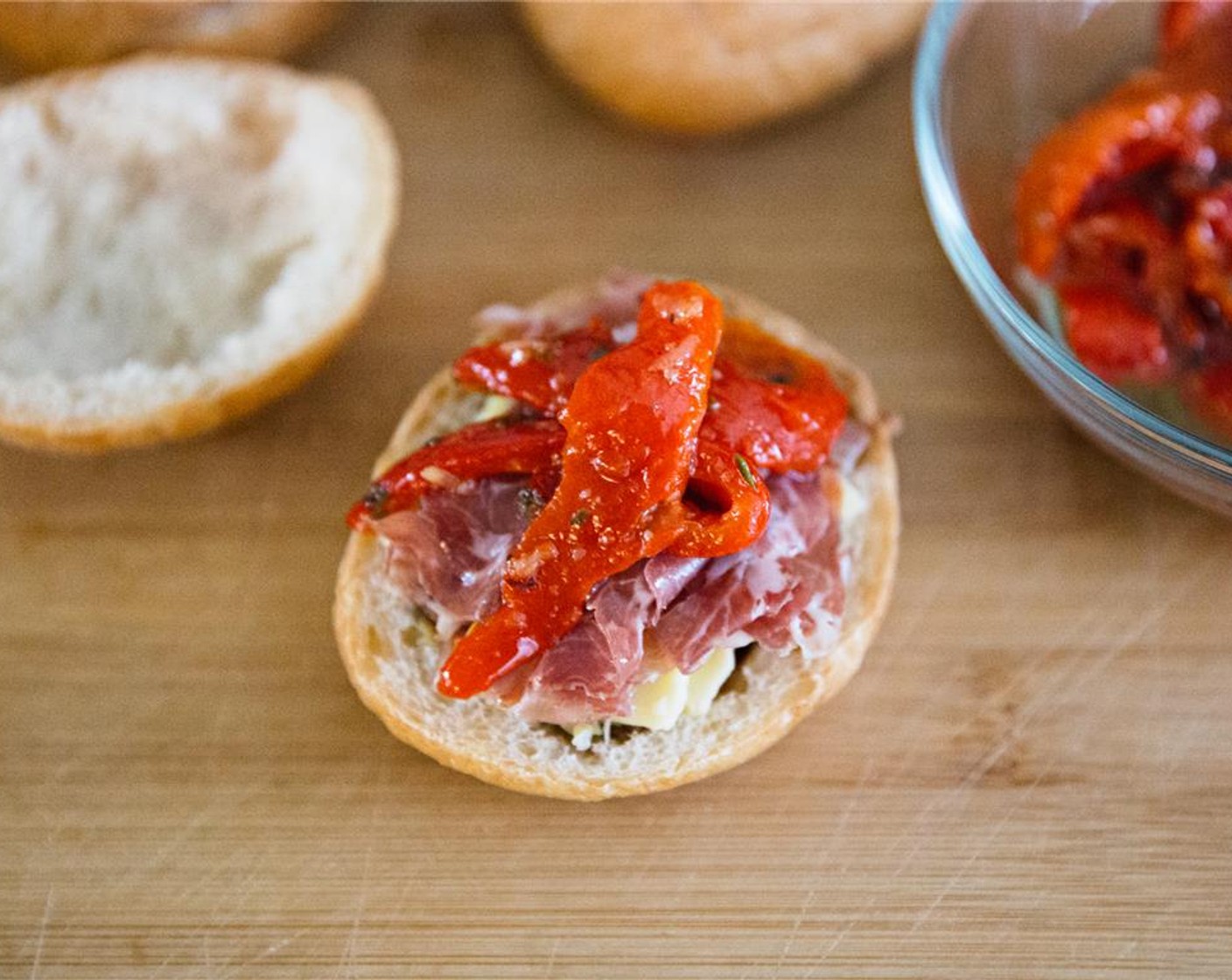 step 9 Place a few strips of Jarred Roasted Red Peppers (4 Tbsp) on top of the coppa.