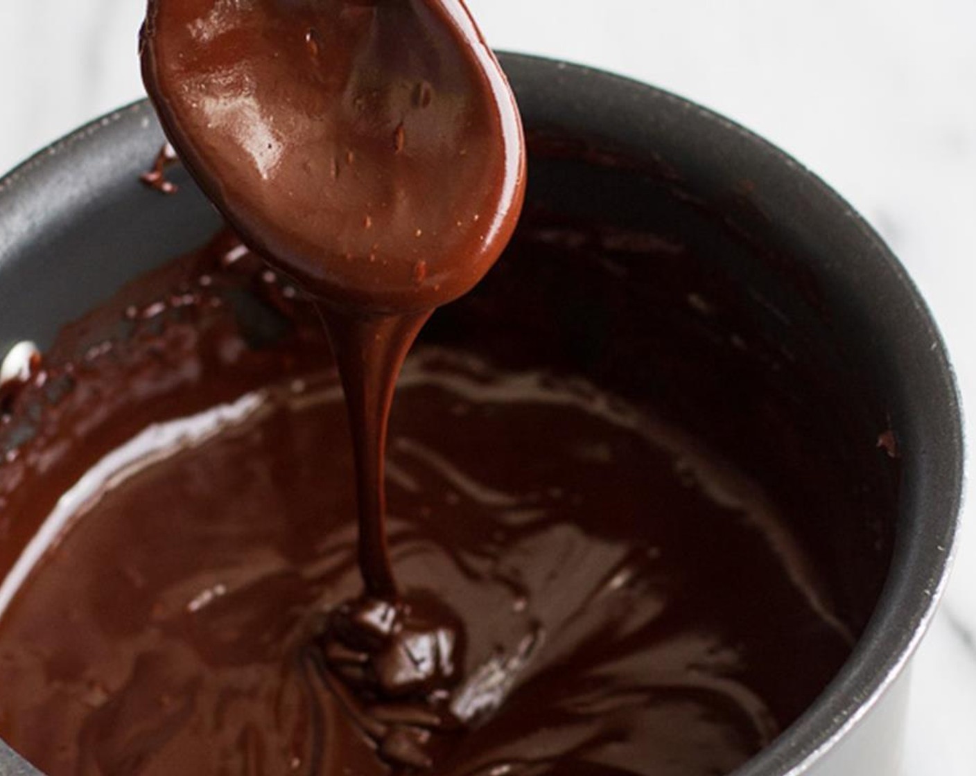 step 3 Heat the Bittersweet Chocolate (1 cup) and Unsalted Butter (4 Tbsp) together on low in a small saucepan, stirring until just melted. Watch it closely to make sure it does not burn.
