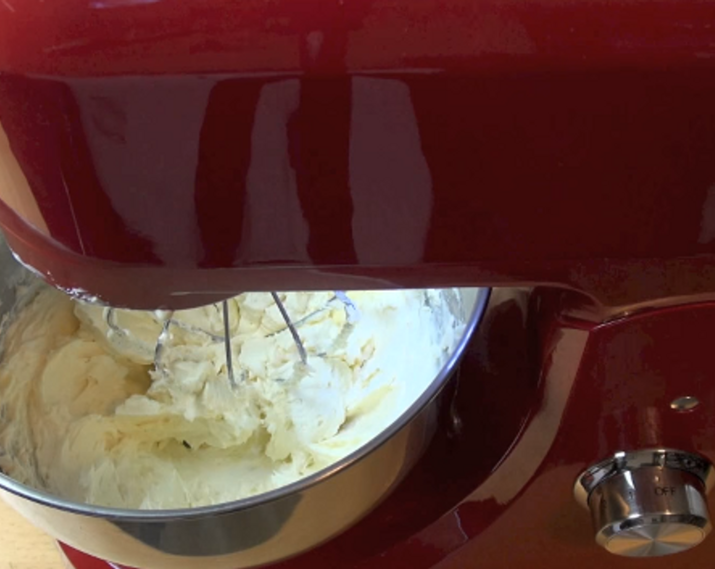 step 2 In the bowl of a stand mixer, add Cream Cheese (1 2/3 cups), Caster Sugar (1/3 cup), and Vanilla Extract (2 tsp), then beat until smooth. Add in Whipping Cream (1/2 cup) and beat again.