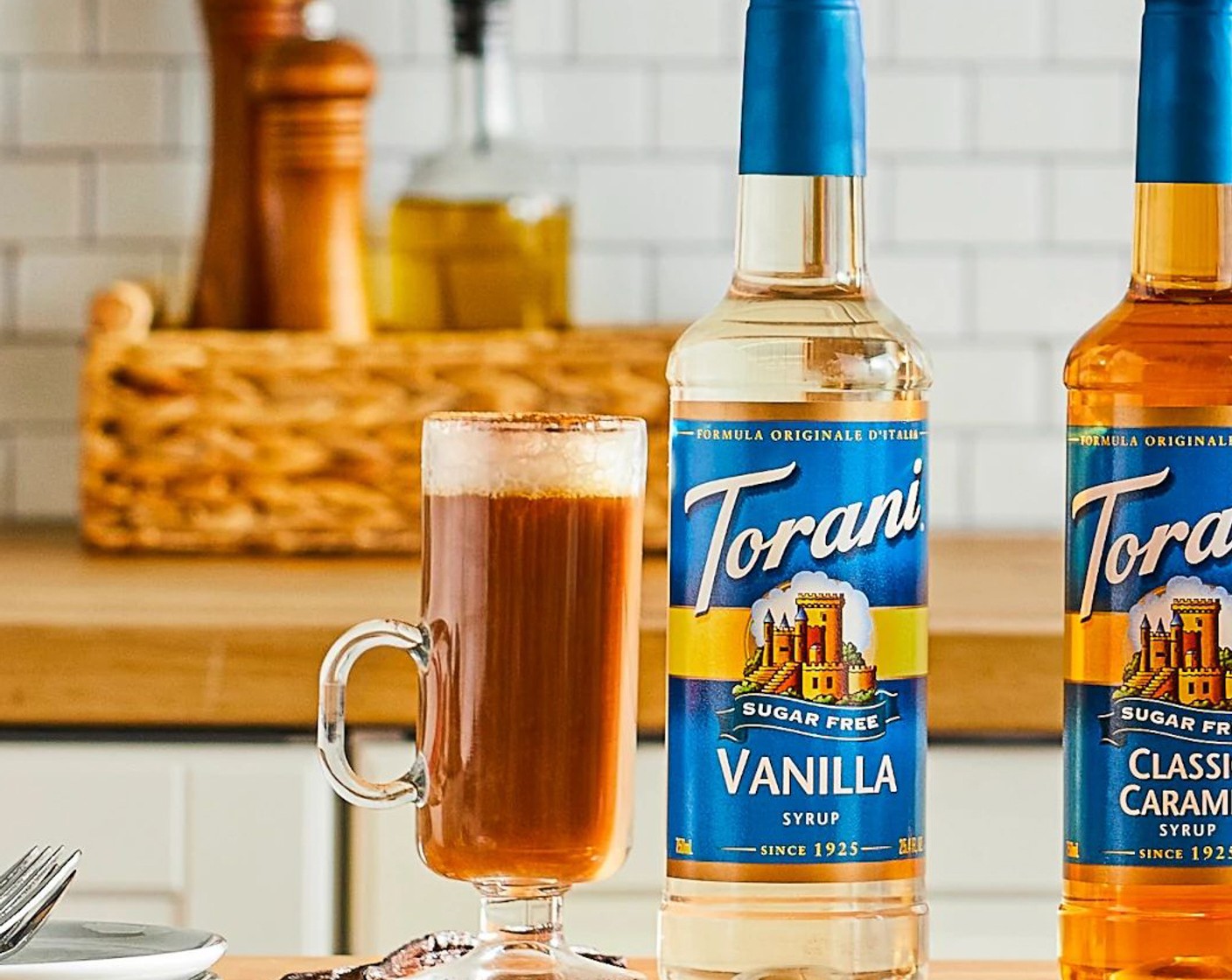 step 1 Combine the chilled espresso (2 fl oz), milk (1 cup), and Torani Sugar Free Vanilla Syrup (2 1/2 Tbsp) in a tall glass filled with ice (to taste) and stir well.